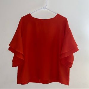 H&M’s cute red orange top